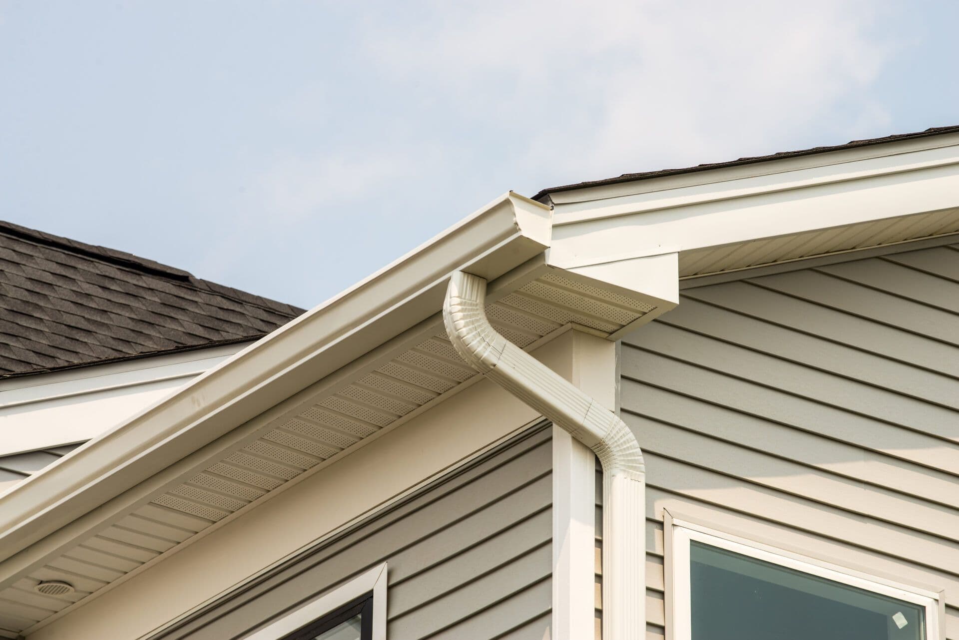 Paramount Builders seamless gutter installation — custom-built on-site gutter system