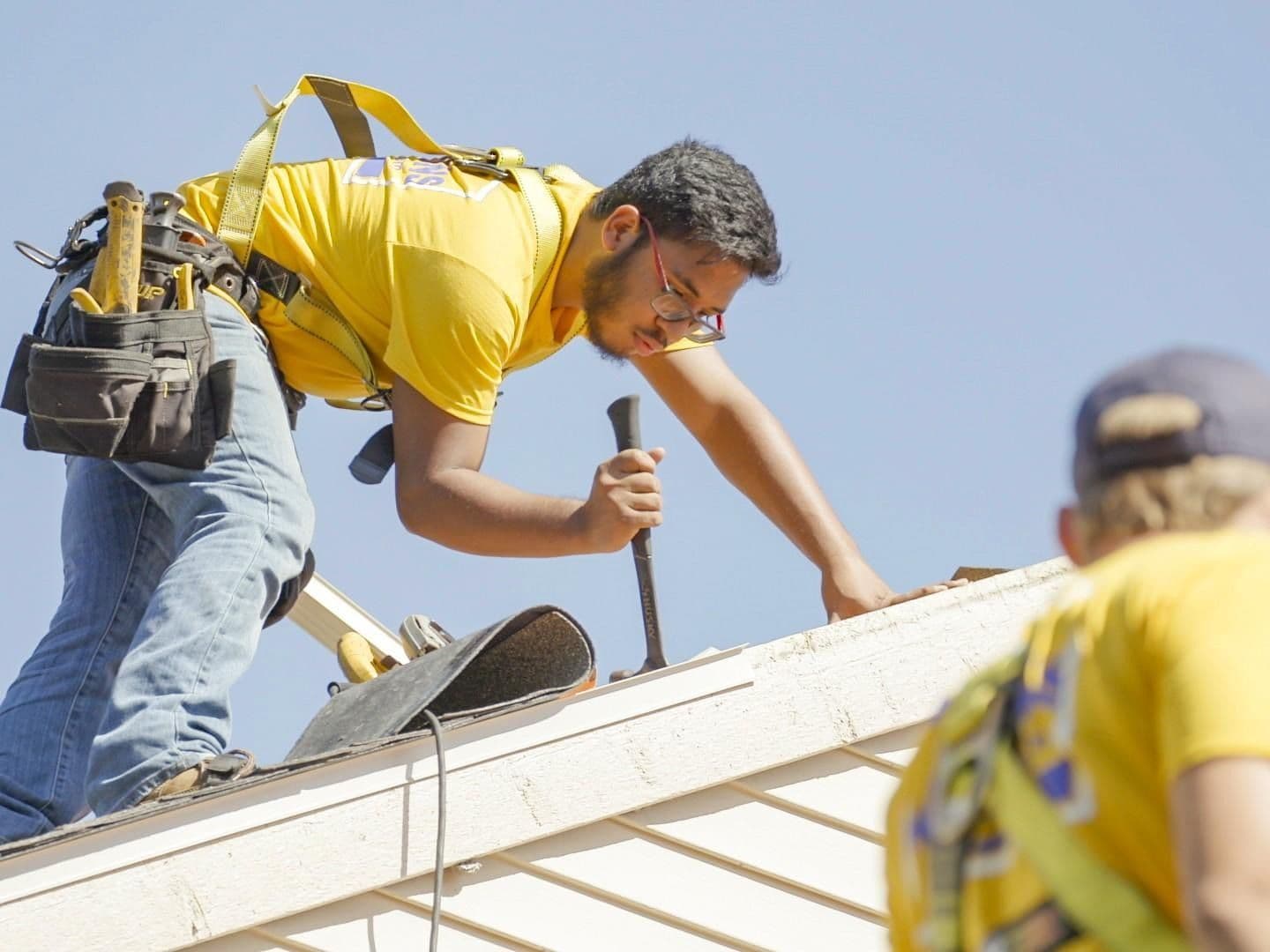 Paramount Builders certified installation team — professional home exterior installation and cleanup