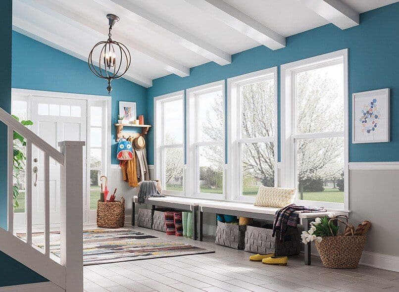 Paramount Builders replacement window installation — Signature Series double hung windows in living room