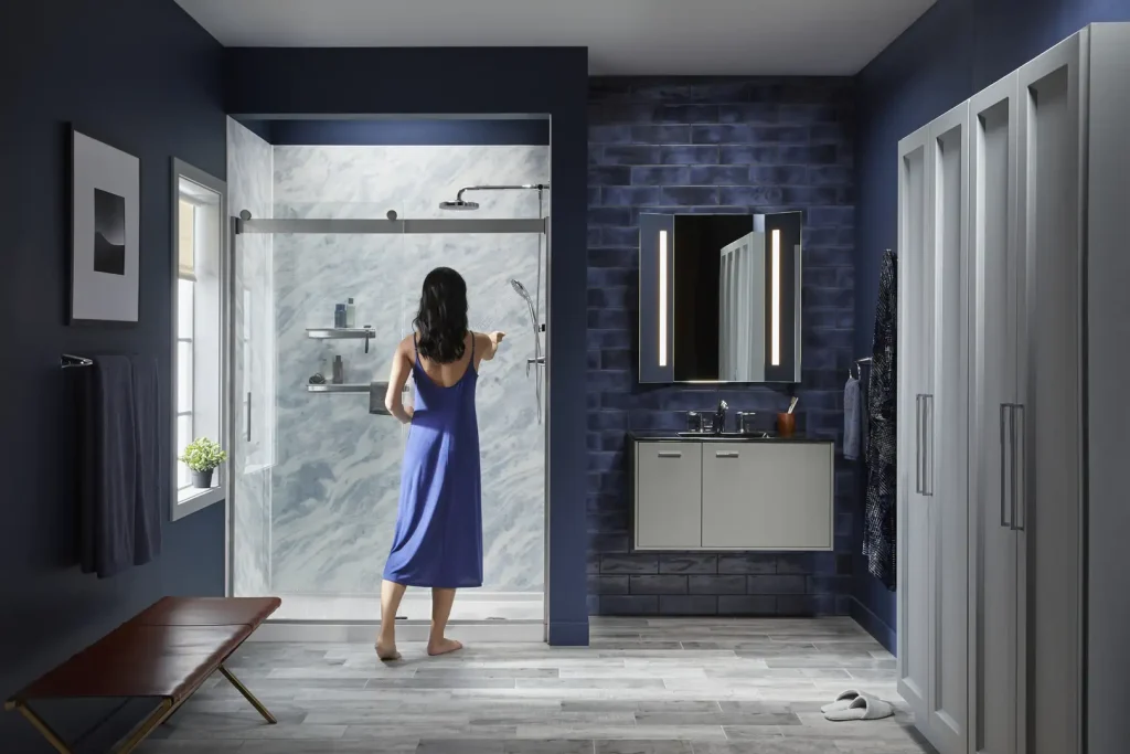 Woman going in a Kohler Shower